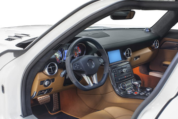 Interior of car. Orange cockpit with carbon decoration
