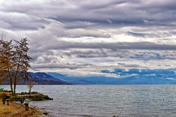 Quay of Geneva lake in Lausanne in stormy weather