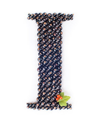 letter i made with black and red currants and green leaves