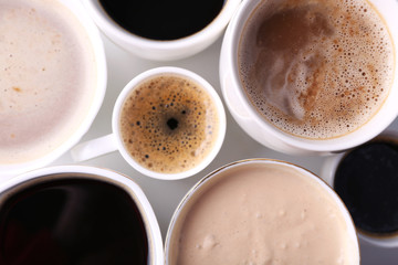 Lots of coffee cups on white background