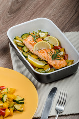 Salmon baked with thyme and Mediterranean vegetables