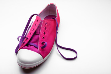 Process of tying shoelace, isolated on white