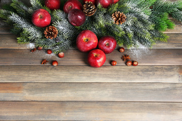Fototapeta na wymiar Christmas apples on wooden table