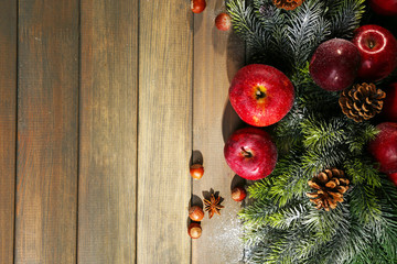 Christmas apples on wooden table