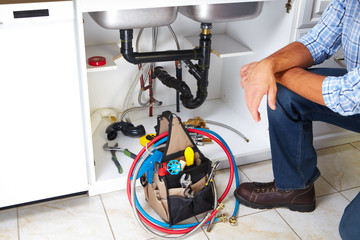 Plumber on the kitchen.