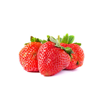 strawberries with leaves on a white background