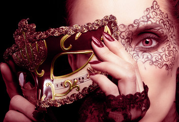Gorgeous woman with mask in marsala colors - obrazy, fototapety, plakaty