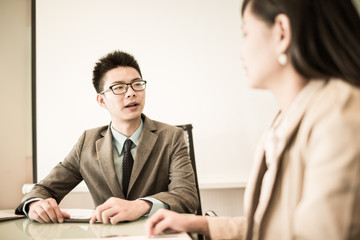 Successful young business executives meeting at the office