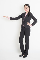  Asian business woman showing copy space