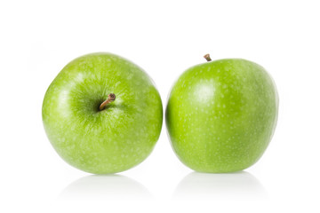 whole green apple isolated on white.