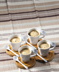 cups of coffee on place mats