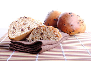 sweet bread with chocolate drops over bamboo placemat