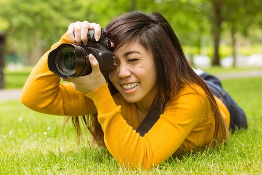 Female photographer at park