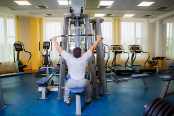 a man engaged in the gym