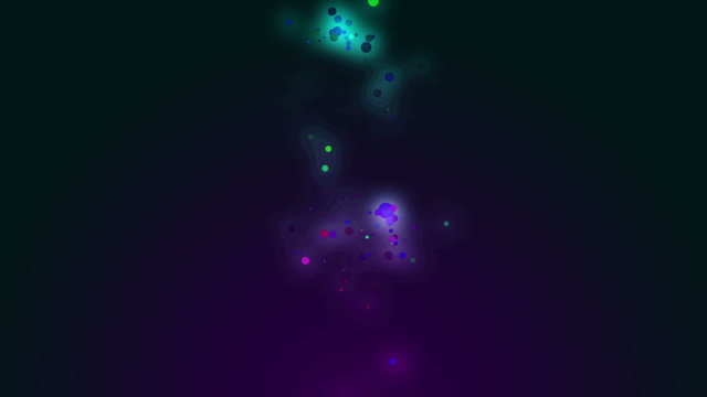 Glowing windy colored particles on the dark background