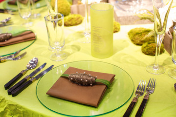 Elegant table set in soft creme for wedding or event party.