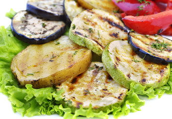 Grilled vegetables on lettuce leaves
