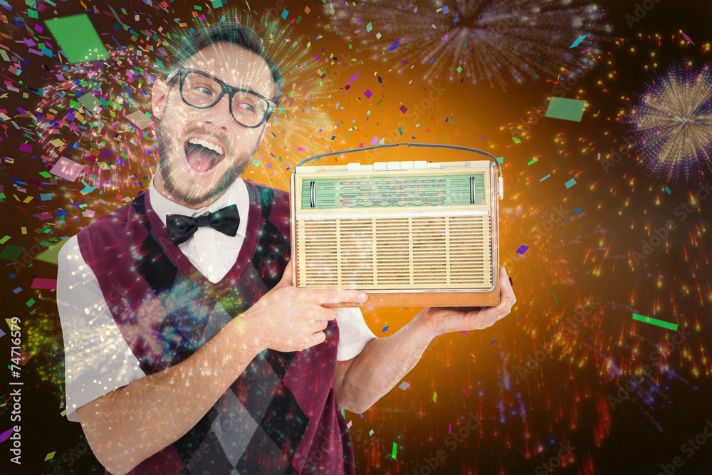 Aufkleber composite image of geeky hipster holding a retro radio