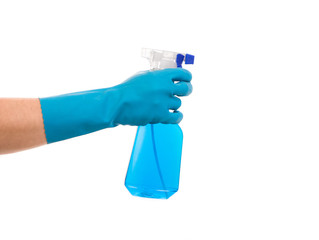 Hand in gloves holds spray bottle.