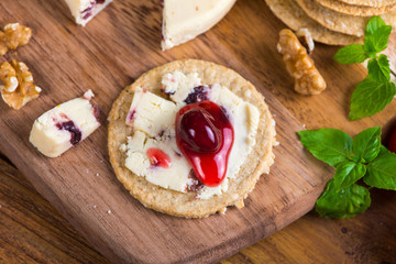 top view on oatcake with stilton cheese and cranberry