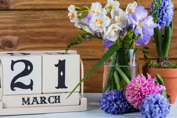 First day of spring flowers and callendar