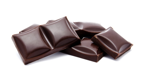 Dark chocolate bars stack with crumbs isolated