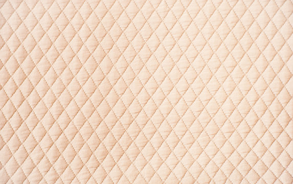 Beige quilted pattern background