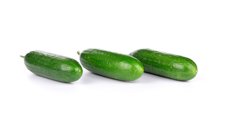 Fresh cucumbers in a row.