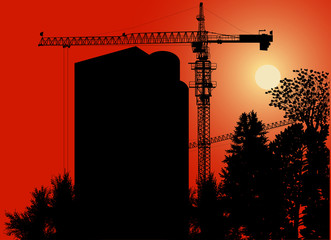 Naklejka premium high house building at red sunset