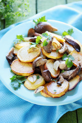 Fried potatoes with oyster mushrooms