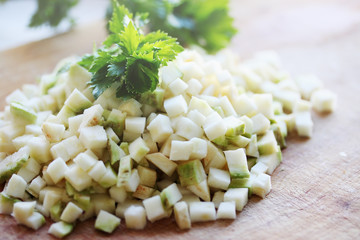 diced celery on a  board