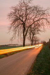 Fototapeta premium tramonto con scia luminosa