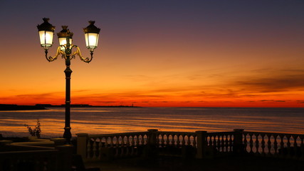 Obraz premium beautiful sunset on the town quay