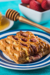 Continental breakfast with strowberry and honey
