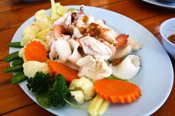 Mixed vegetables with seafood.