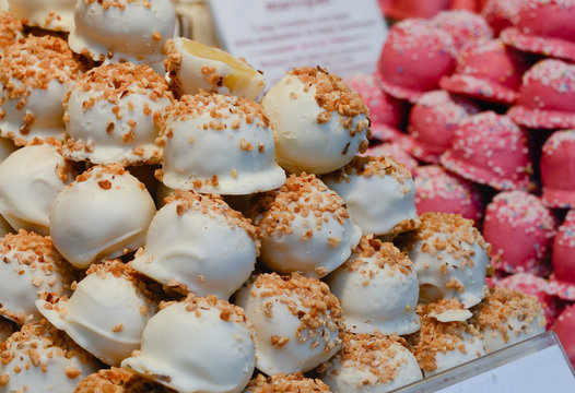 Christmas market food - close up of sweets, marzipans.
