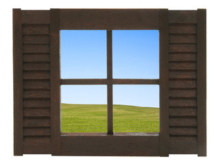 Fenster mit Aussicht auf eine Feldlandschaft
