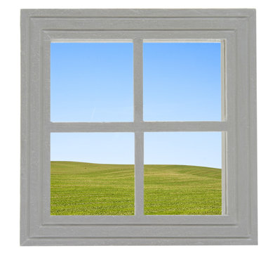 Fenster mit Aussicht auf eine Feldlandschaft
