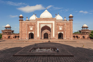 mosque and shadow of taj mahal
