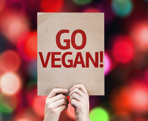 Go Vegan card with colorful background