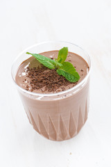 chocolate milkshake in a glass, close-up