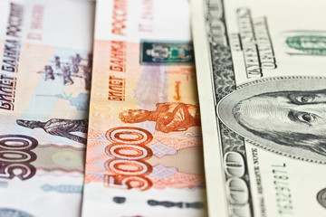 Hundred dollars, five thousand and five hundred rubles