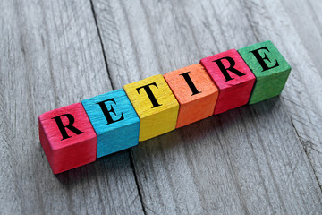 concept of retire word on colorful wooden cubes