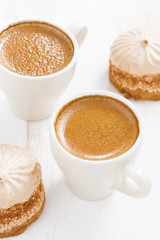 fresh espresso and cakes for breakfast, top view