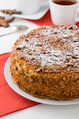 delicious layered cake on white plate