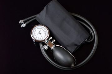 Professional sphygmomanometer isolated on black