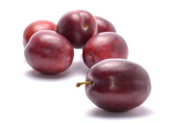 plums isolated on white background