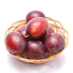 Plums isolated on white background