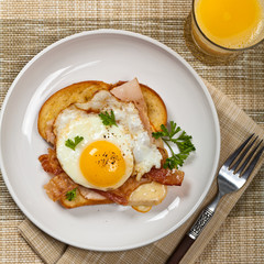 French breakfast toast with fried eggs. Selective focus.