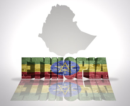 Word Ethiopia on a map background